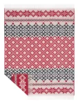 A wool blanket with a folk-inspired design in red, gray, and white, featuring intricate geometric patterns and fringe edges, made by weaving mill Barker Textiles.