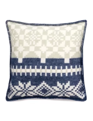 Square cushion cover with a traditional Nordic-inspired pattern in blue and white, featuring geometric shapes and intricate designs made by weaving mill Barker Textiles.