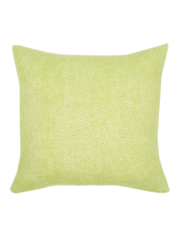 A rectangular, light green cushion with a subtle chevron pattern, made by weaving mill Barker Textiles.