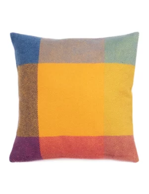 Square cushion cover with a colorful plaid design, featuring large squares in shades of yellow, orange, blue, and green made by weaving mill Barker Textiles.