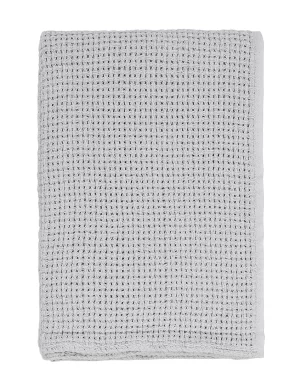 Gray blanket featuring a cellular weave texture, neatly folded, made by weaving mill Barker Textiles.