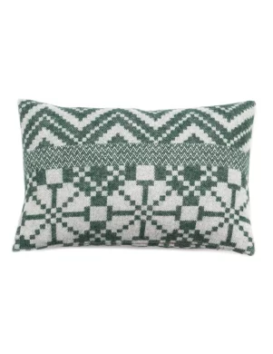 Rectangular cushion cover with a green and white traditional geometric pattern, showcasing various shapes and zigzags made by weaving mill Barker Textiles.