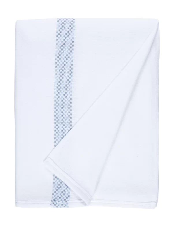 A white blanket with a folded corner, featuring a light blue decorative stripe along one edgemade by weaving mill Barker Textiles.